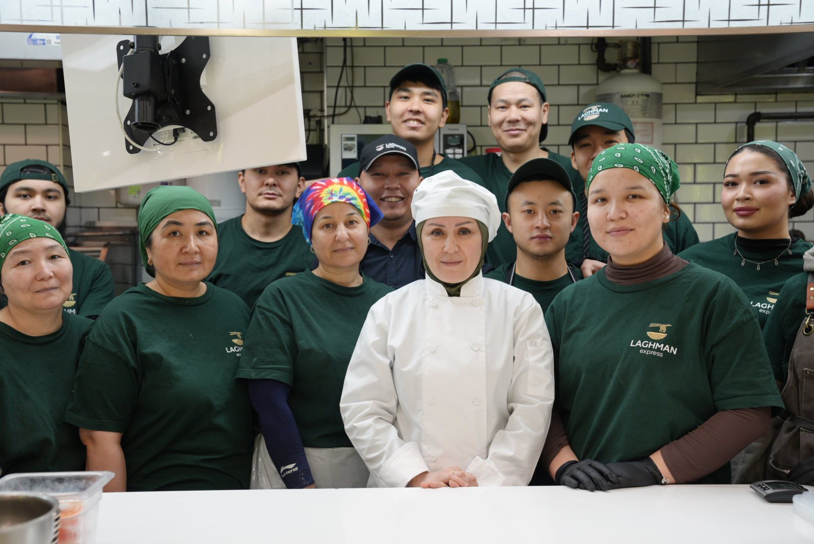 The Laghman Express team with Brand Chef-Author Gulnoza Jurayeva at the kitchen counter