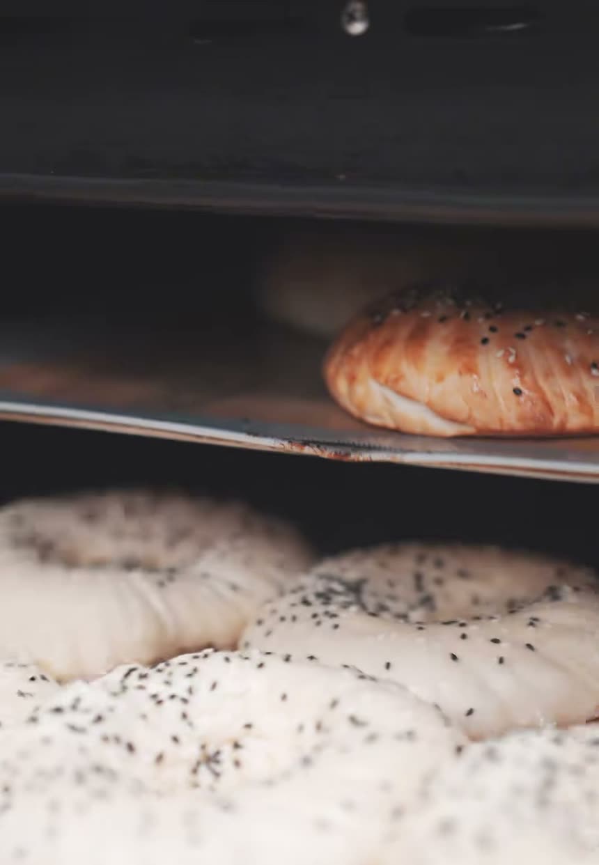 Round seeded Central Asian bread from the oven